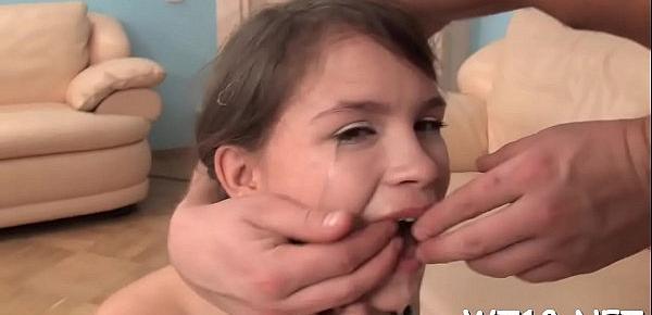  Breathtaking teen girl licks large dick